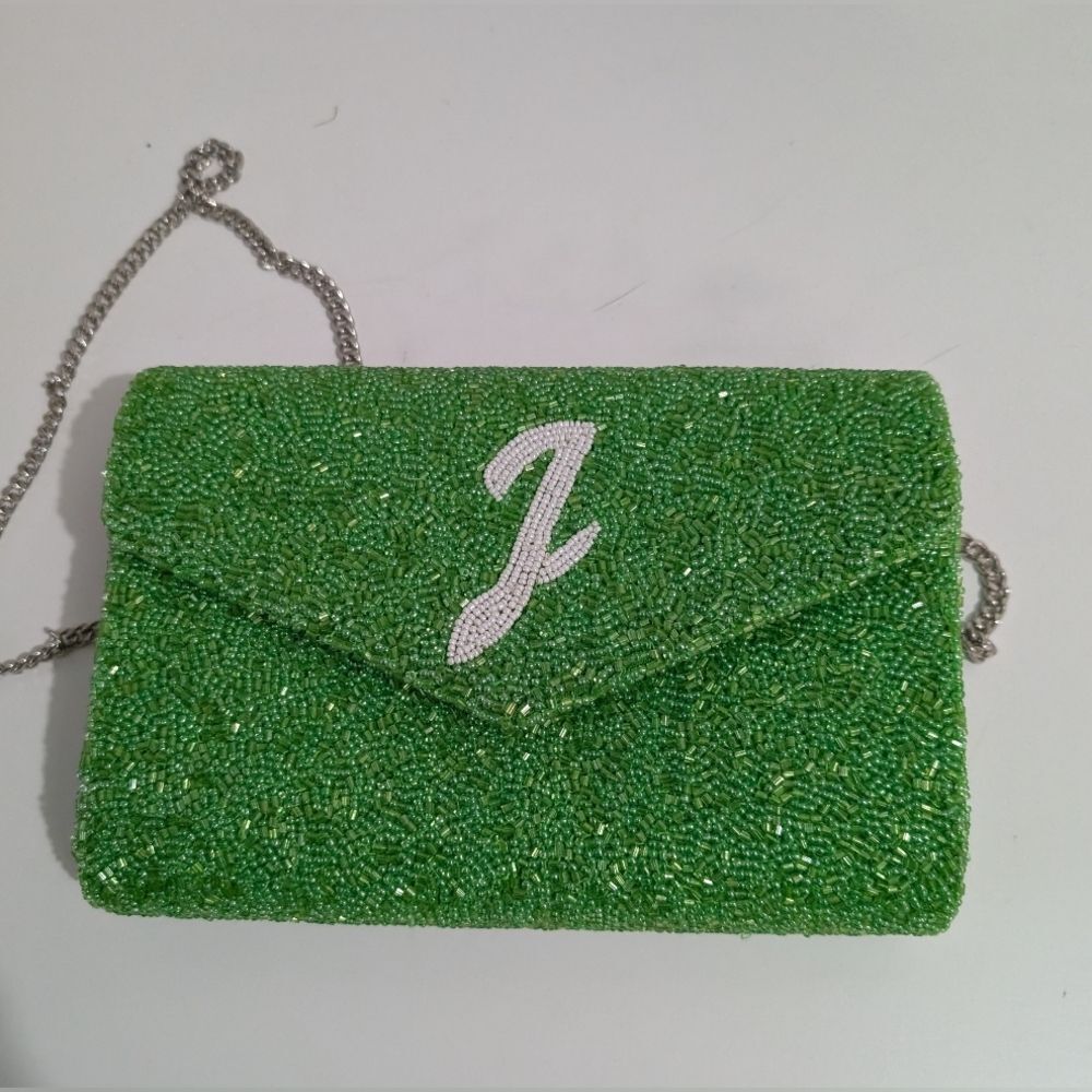 Island to East Side "J" Green Glitter clutch
